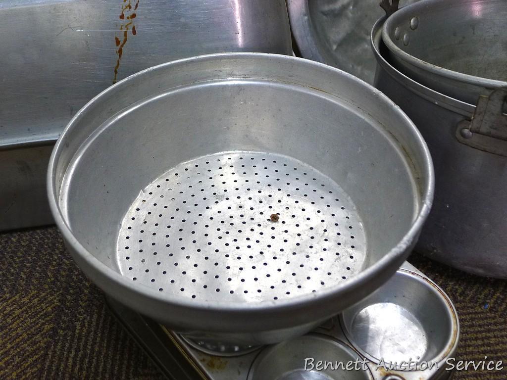 Roasters, strainer, muffin tins, pots, more. Box is 21" long.