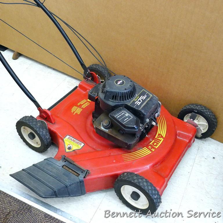 Rally lawn mower has a 3.75 HP Briggs & Stratton Sprint engine and a 22" deck. Gas tank is dry, so