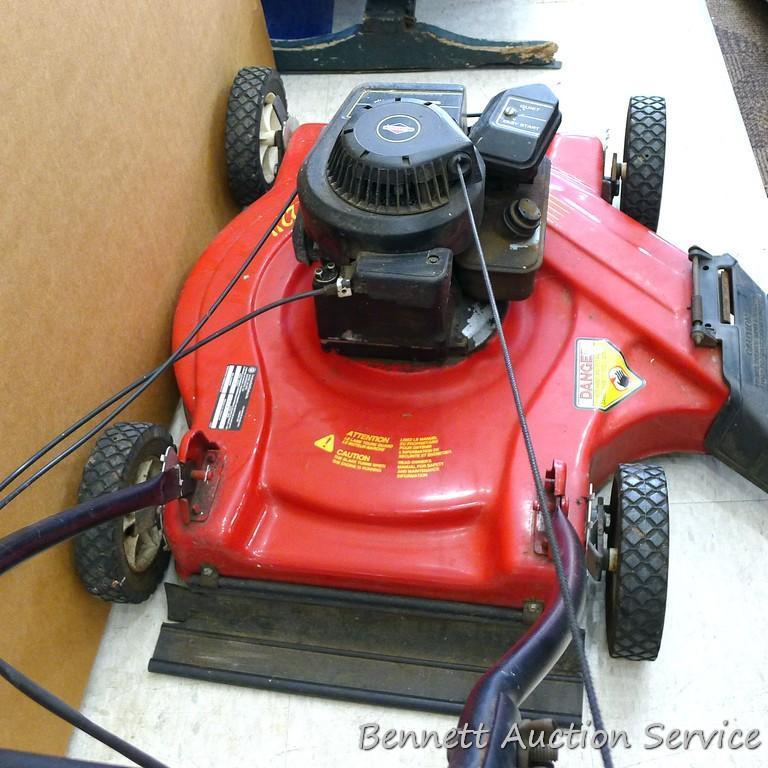 Rally lawn mower has a 3.75 HP Briggs & Stratton Sprint engine and a 22" deck. Gas tank is dry, so