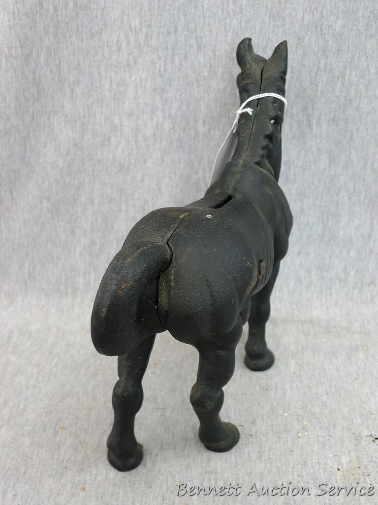 Antique cast iron horse bank is 9" x 10".