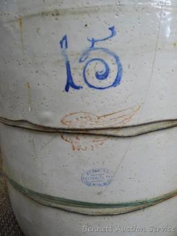 15 gallon Red Wing crock is held together with wire. Measures about 19" x 19" over handles. Ship at
