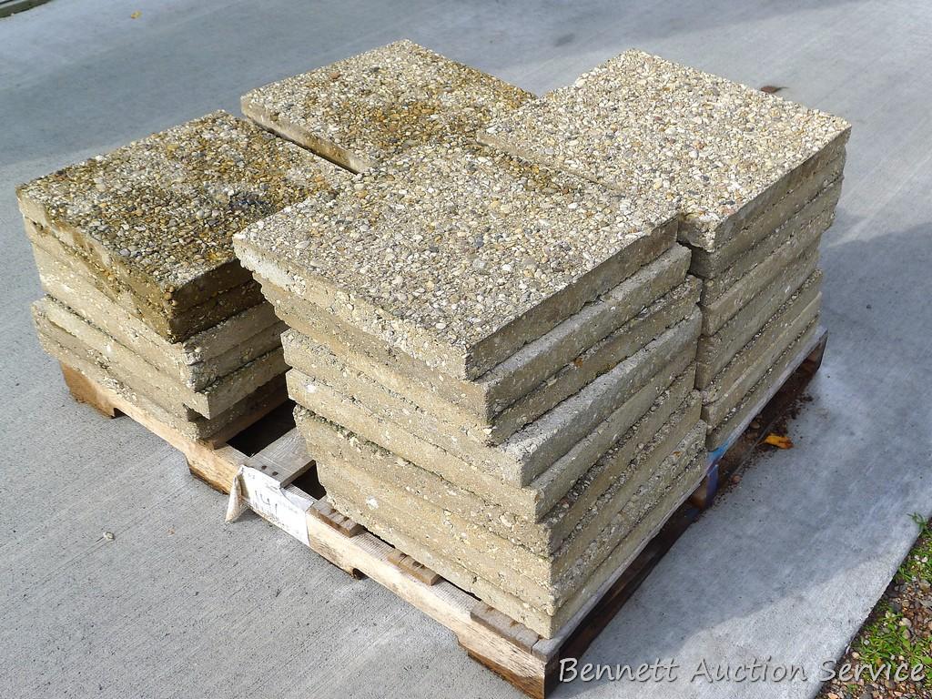 32 concrete pavers are all about 18" x 18".