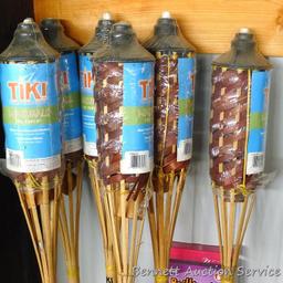 The ultimate summer or camping lot includes 6 NIP tiki torches, Lasso Golf, Frisbee, 84" bird kite