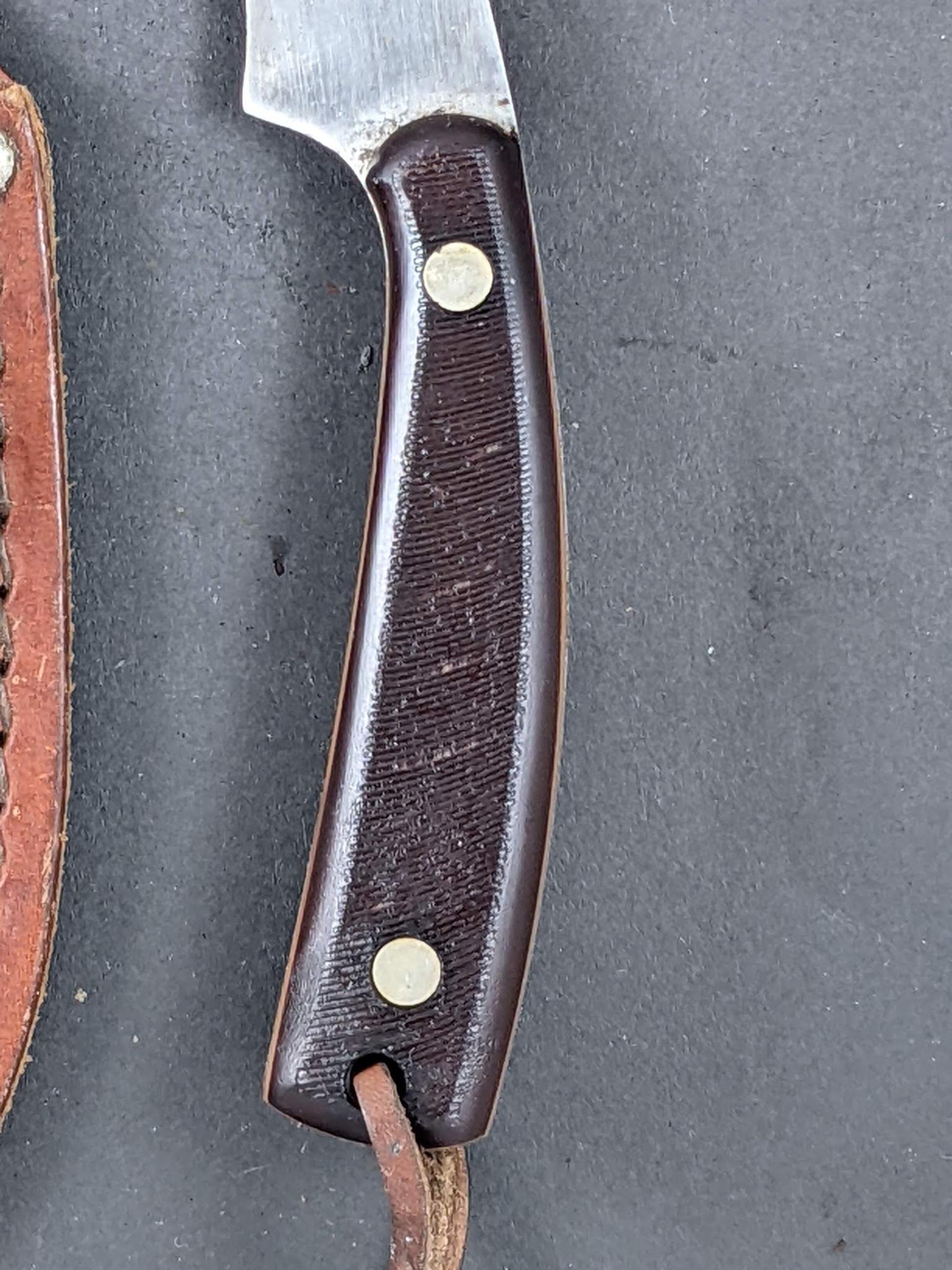 "Old Timer" Schrade U.S.A. sheath knife. Model NO. 158OT. Measures 7'' overall. Handle and blade are