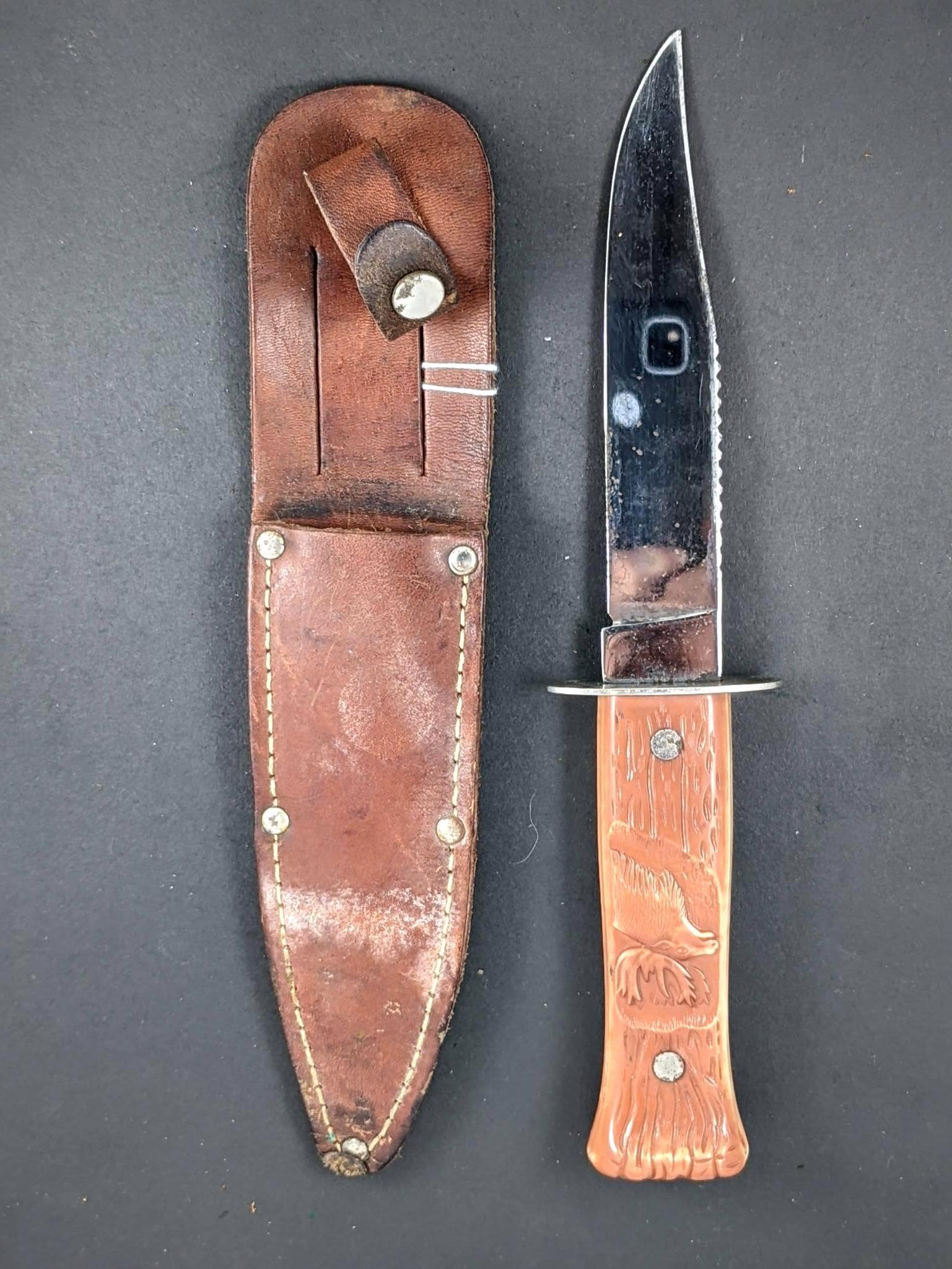 Imperial Prov, R.I. U.S.A sheath knife. Measures 9'' overall. The handle and blade are both tight.