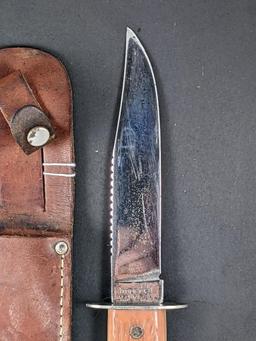 Imperial Prov, R.I. U.S.A sheath knife. Measures 9'' overall. The handle and blade are both tight.