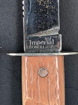 Imperial Prov, R.I. U.S.A sheath knife. Measures 9'' overall. The handle and blade are both tight.