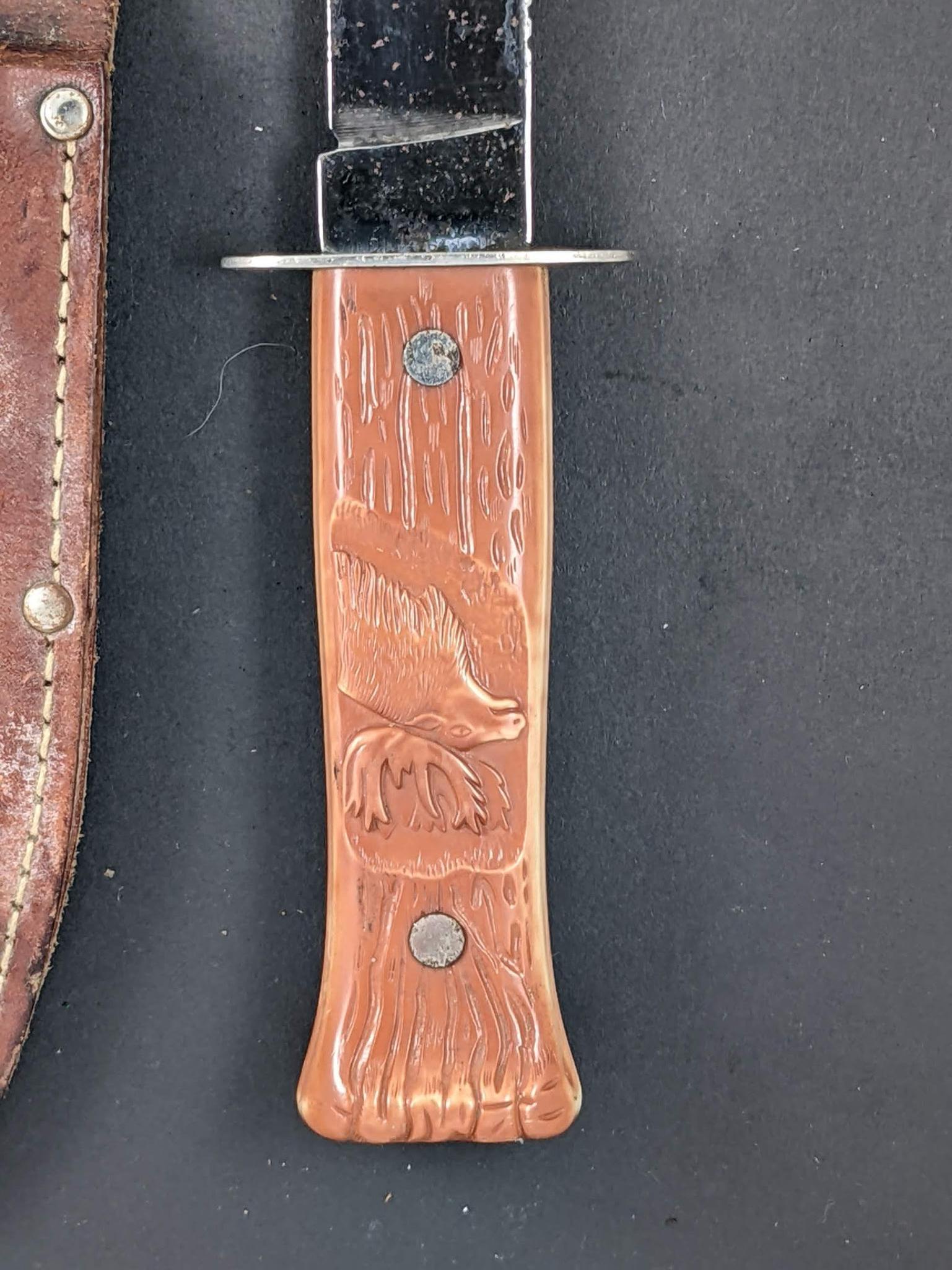 Imperial Prov, R.I. U.S.A sheath knife. Measures 9'' overall. The handle and blade are both tight.