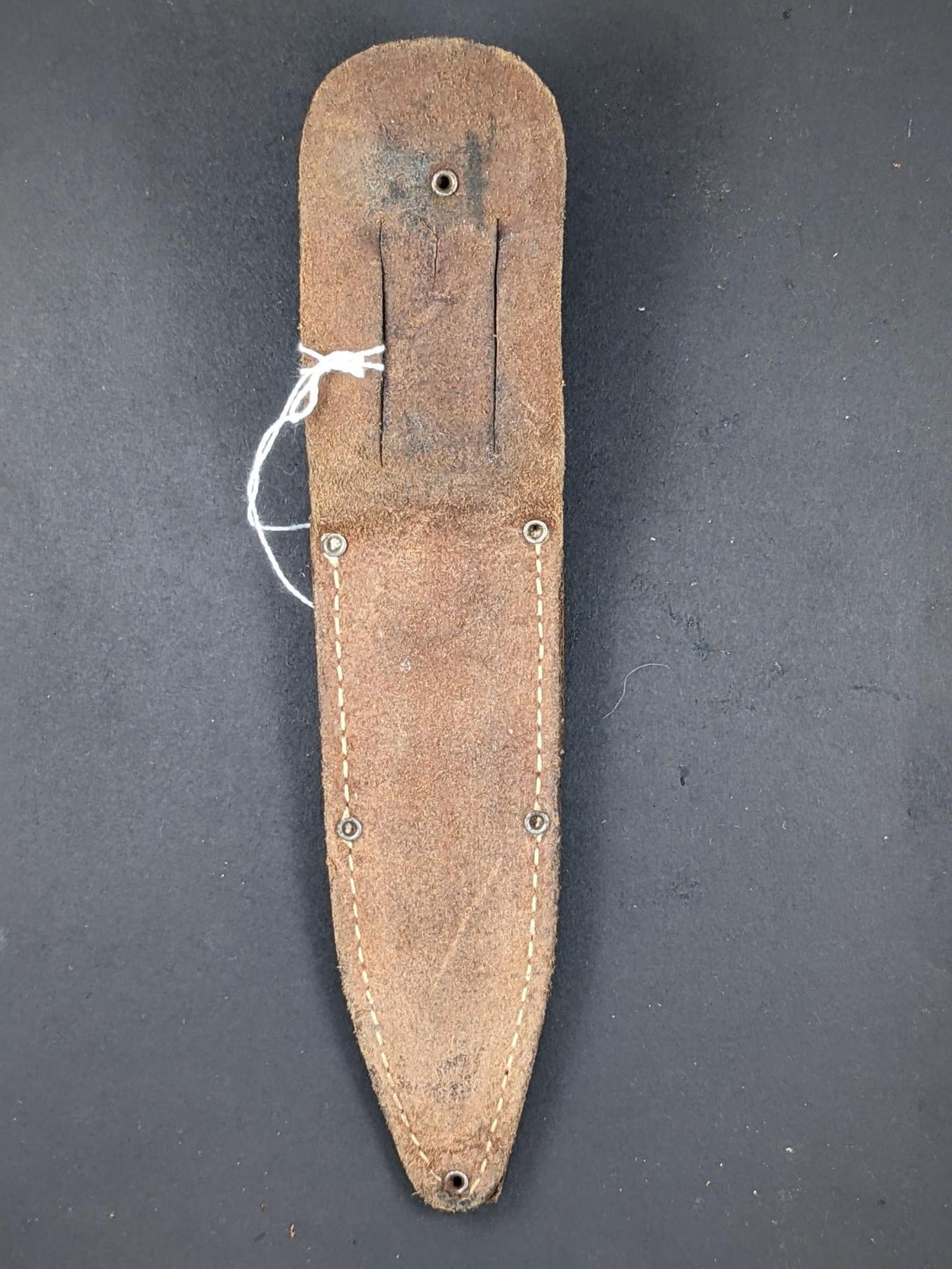 Imperial Prov, R.I. U.S.A sheath knife. Measures 9'' overall. The handle and blade are both tight.