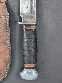 Pal sheath knife measures 9-1/2" long overall. Model is either RH 34 or PH 34, take a look at the