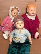 Three large composite dolls with soft bodies. Tallest is just over 2'. Some chipping and cracking in