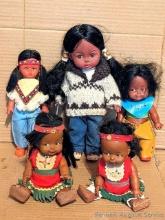 Five Native American souvenir-type dolls up to 12". Tallest doll was made by Boma in Canada.