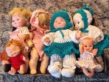Six assorted baby dolls up to 14".