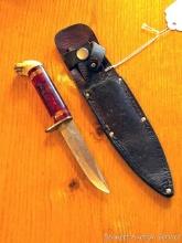 Small handmade knife with antler end piece is approx. 7" overall. Blade guard are tight. Comes with