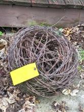 1-1/2' ball of barbed wire will make a nice garden art piece.