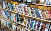 Located in basement, bring help to remove. VHS tapes including Indiana Jones, westerns, more.