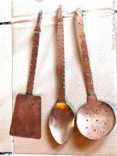 Copper colored kitchen utensil decorations. Longest measures approx 14"