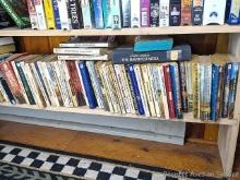 Located in basement, bring help to remove. Louis L'Amour books, possibly others - shelf measures 30"
