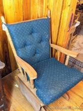 Located in basement, bring help to remove. Glider rocker is in good condition, 25" over arms. Glides