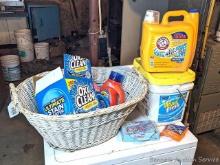 Located in basement, bring help to remove. No shipping. 2' wicker laundry basket, full bottle of
