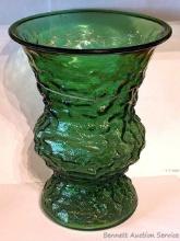 9-1/2" E.O. Brody Co green glass flower vase measures 7-1/2" across. No chips or cracks noted. Great