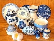 Variety of perfectly coordinated blue and white pitchers, dishes, creamer, salt and pepper shaker,