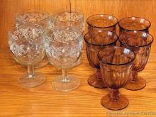 Set of five amber colored goblets and four grapevine wine glasses. Goblets measure 5-1/2" tall, wine