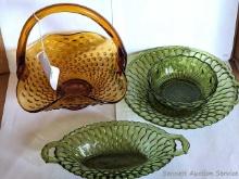 Amber hobnail pattern basket with applied handle, and three green glass pieces up to 9" over