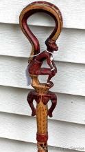 Eye-catching African tribal style walking stick or decor measures 36" tall.