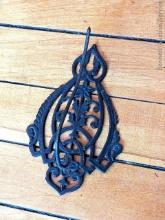 Antique cast iron receipt holder is about 6" tall and in good condition, spike is just loose.