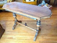 Sturdy side table or sofa table is about 4' x 1-1/2' x 2-1/2' high. Looks like it's in good