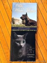 Two coffee table books incl The Elegance of The Cat and Pets in The Whitehouse. Dust cover of cat