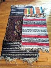 67" x 31" rug and some Southwest blankets or rugs. Piece with blues is nearly 7' x 4' over fringe.