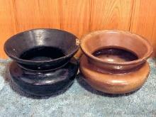 Pair of black and brown spittoons or planters, measure 7-1/2" across. Some chipping noted on rim on