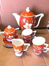Tea set including teapot, creamer & sugar set, 4 cups and saucers is stamped Erphila Est. 1886, made
