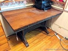 Nice table with wicker base; measures 30" x 54" x 30" tall. Table top has a nice finish and overall