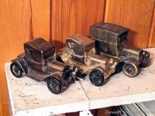 Located upstairs, bring help to remove. Three automobile or car coin banks, two are advertising
