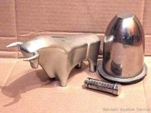 Located upstairs, bring help to remove. Promotional Merrill Lynch bull coin bank, lockable silver