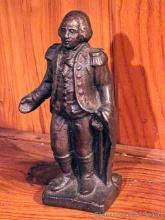 Located upstairs, bring help to remove. Vintage cast iron George Washington coin bank is about 6"