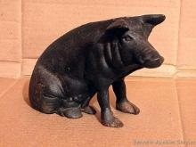 Located upstairs, bring help to remove. Cast iron pig coin bank is in good condition and about 10"
