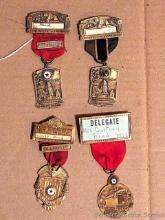 Located upstairs, bring help to remove. Four vintage pins up to around 4-1/2".
