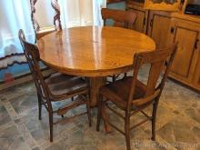 Gorgeous antique table with three chairs. Table is about 43" wide and 30" tall. Chairs about 18" to