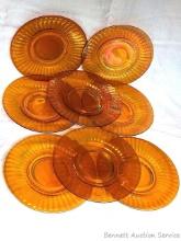Set of 8 Carnival glass or iridescent glass salad or dessert plates are about 8" wide. Two plates