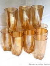 Eleven 5" tall Carnival glass or iridescent glasses are very eye catching, pretty classy.