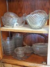 Pretty glassware pieces incl 9" serving bowl, grape pattern bowl, set of matching bowls, more.