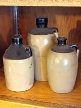 Two stoneware and one other jug. Tallest bout 6", all in good condition, smaller with store tag with