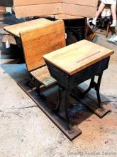 Located in basement, bring help to remove. Antique school desks - set up currently measures 39" long
