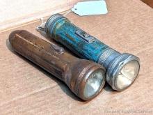 Located in basement, bring help to remove. Old style Ray-O-Vac and Burgess flashlights are about 8"