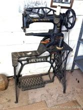 Located in basement, bring help to remove. Antique Singer leather sewing machine is numbered on