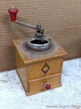 Located in basement, bring help to remove. Cute little Garantie coffee grinder measures 4-1/2" x